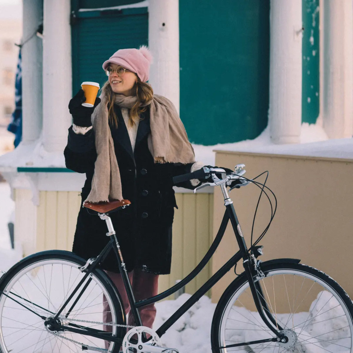 Woman with Pelago City Bike in Winter