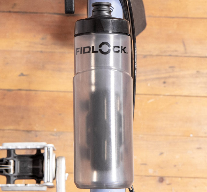 Fidlock Cageless Water Bottle - 600mL with Universal Base Adapter on main frame of brompton