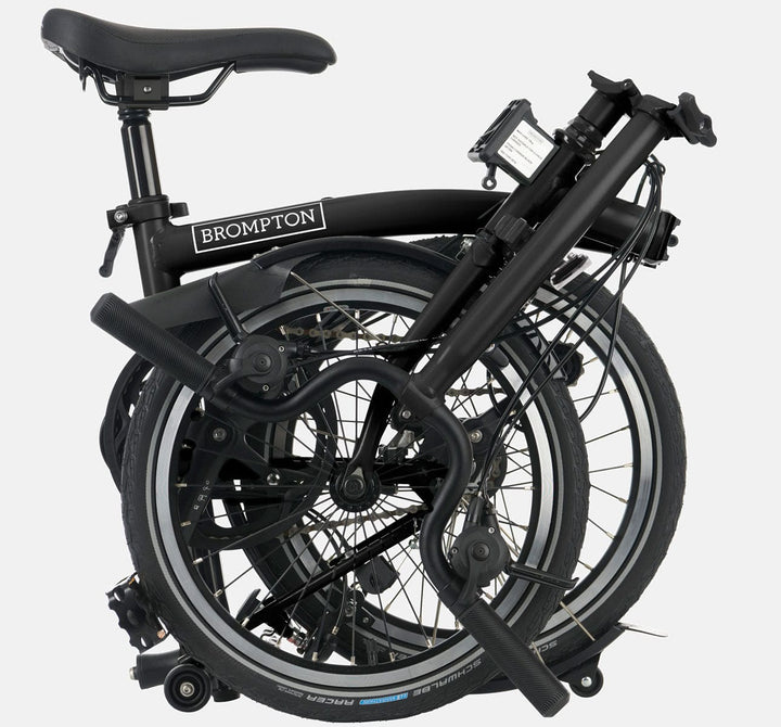 2023 Brompton C Line Explore High Handlebar folding bike in Matte Black - folded