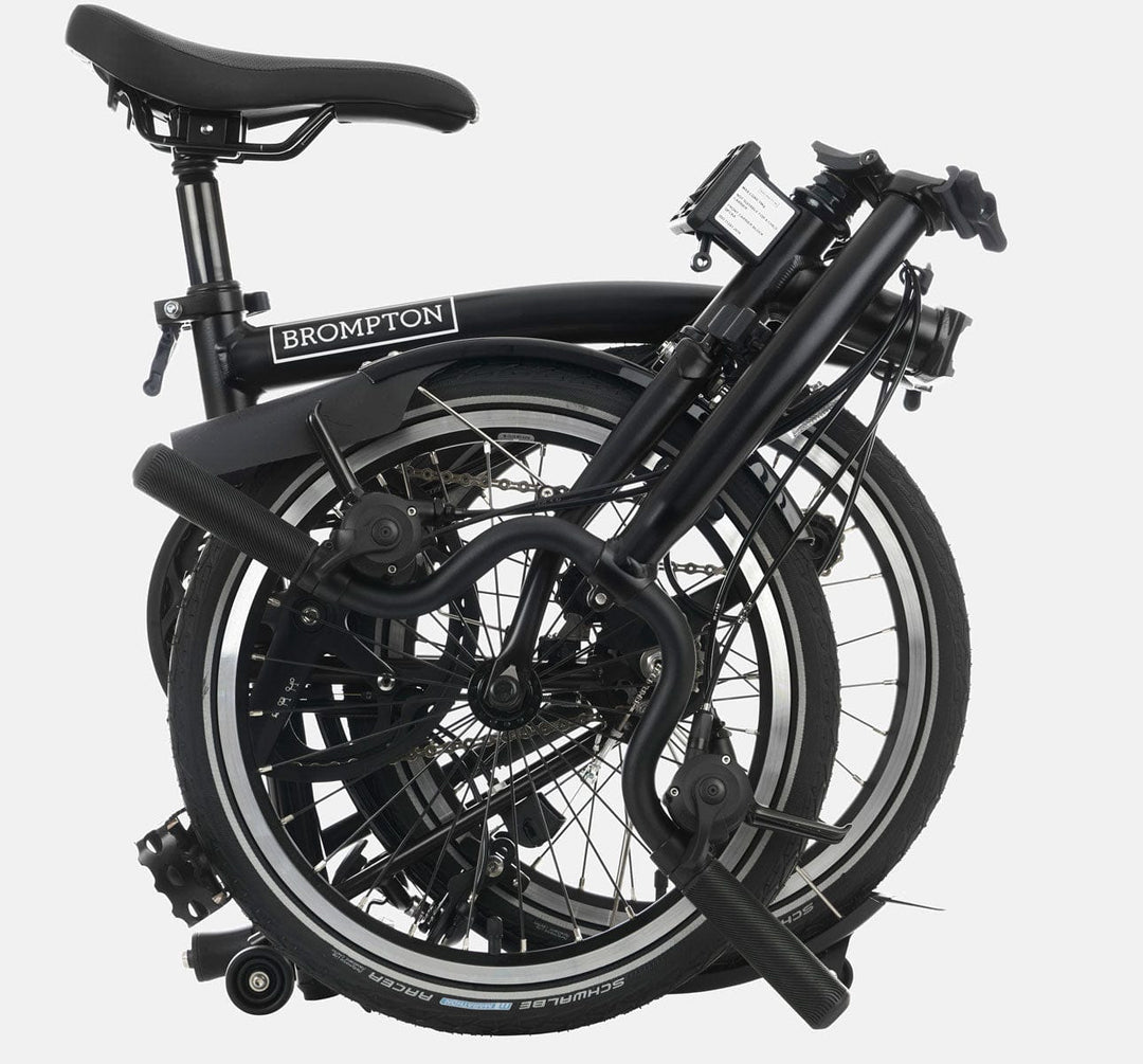 2023 Brompton C Line Urban Mid Handlebar 2-speed folding bike in Black Matte - folded