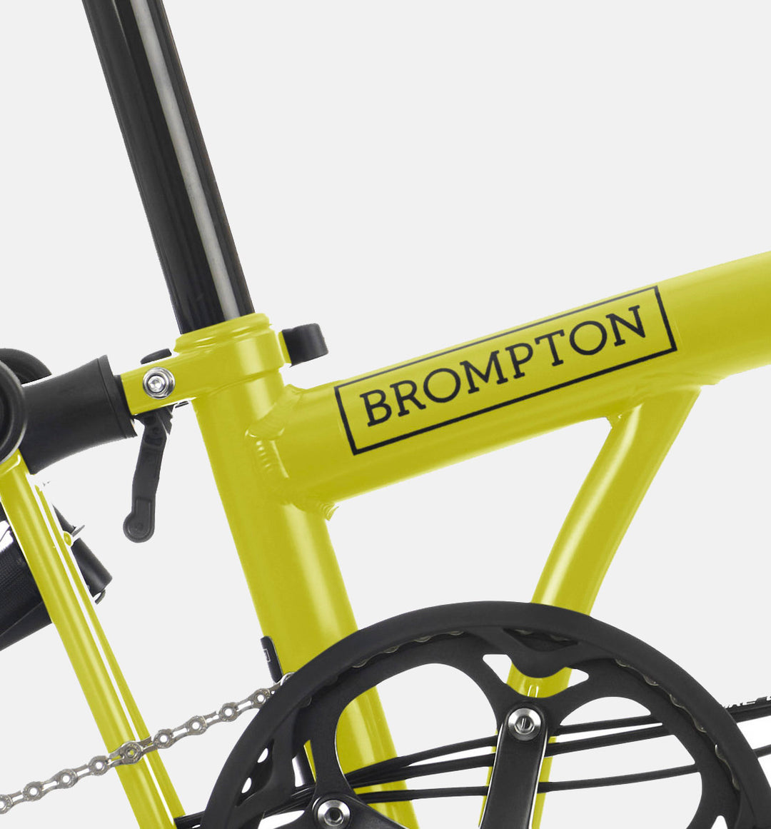 Close Up Of Brompton C Line British Folding Bike in Colour Yuzu Lime