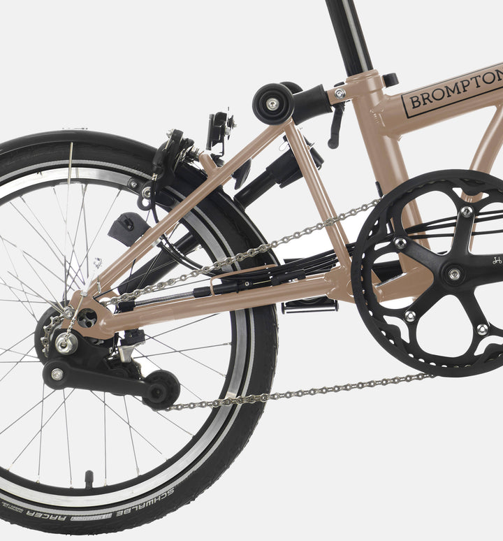 Close Up Of Brompton C Line British Folding Bike in Colour Dune Sand