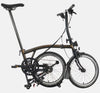 2023 Brompton C Line Urban Low Handlebar 2-speed folding bike in Black Lacquer - kickstand mode