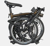 2023 Brompton C Line Urban Mid Handlebar 2-speed folding bike in Black Lacquer - folded