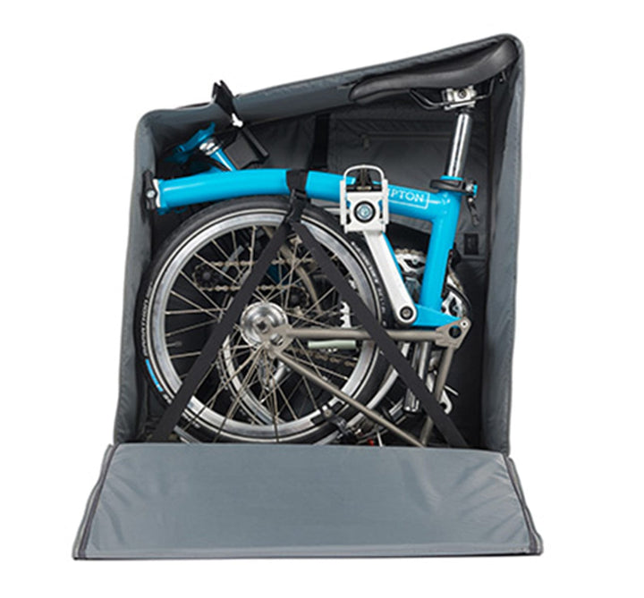 Brompton Padded Travel Bag with Four Rollers Shown Open with a Brompton Bike (5251453955)