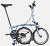 2023 Brompton C Line Explore Mid Handlebar 6-speed folding bike in Cloud Blue - kickstand mode