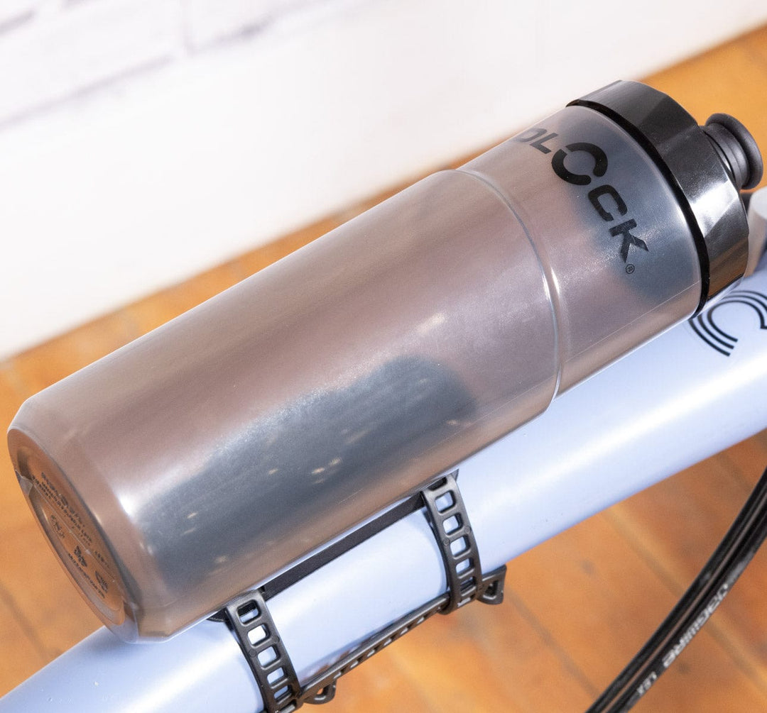 Fidlock Cageless Water Bottle - 600mL with Universal Base Adapter on main frame of brompton