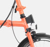 2023 Brompton C Line Explore High Handlebar 6-speed folding bike in Fire Coral - Front Carrier Block