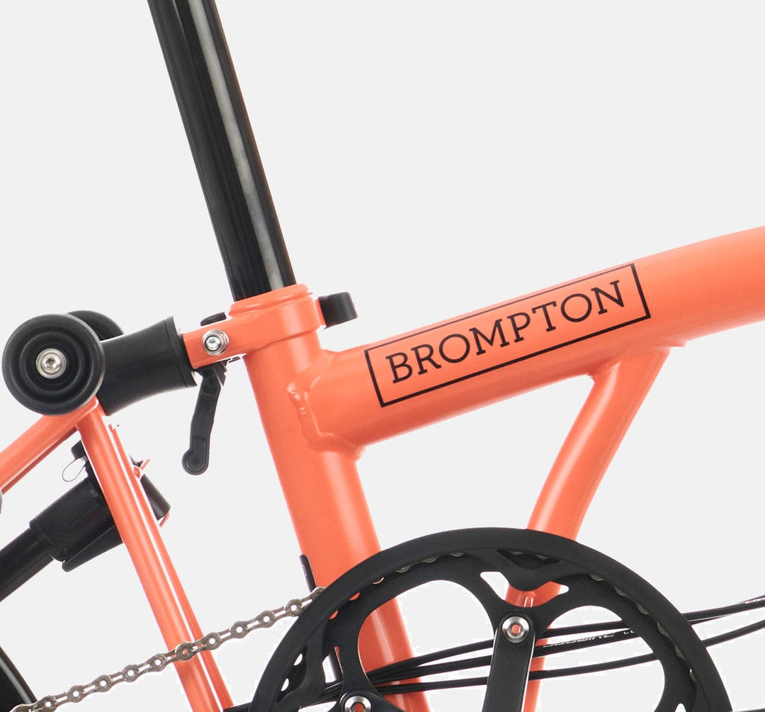 2023 Brompton C Line Urban Low Handlebar 2-speed folding bike in Fire Coral - steel frame