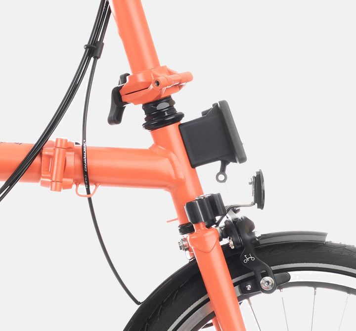 2023 Brompton C Line Explore Low Handlebar 6-speed folding bike in Fire Coral - Front Carrier Block