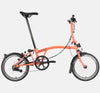 2023 Brompton C Line Explore Low Handlebar 6-speed folding bike in Fire Coral - profile