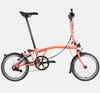 2023 Brompton C Line Explore Mid Handlebar 6-speed folding bike in Fire Coral - profile