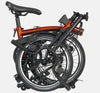 2023 Brompton C Line Urban High Handlebar 2-speed folding bike in Flame Lacquer - folded