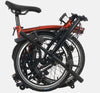 2023 Brompton C Line Explore Low Handlebar 6-speed folding bike in Flame Lacquer - folded