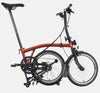 2023 Brompton C Line Explore Low Handlebar 6-speed folding bike in Flame Lacquer - kickstand mode