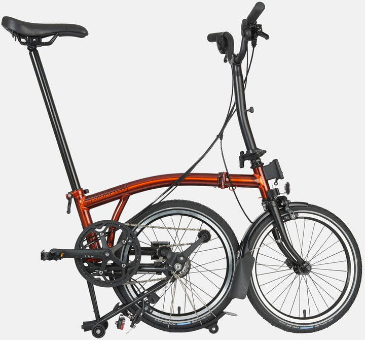 2023 Brompton C Line Urban Mid Handlebar 2-speed folding bike in Flame Lacquer - kickstand mode