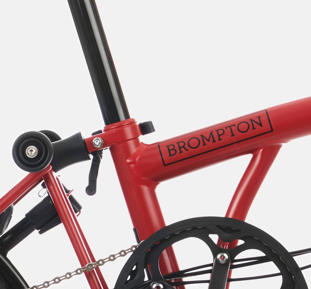 2023 Brompton C Line Explore High Handlebar 6-speed folding bike in House Red - steel frame