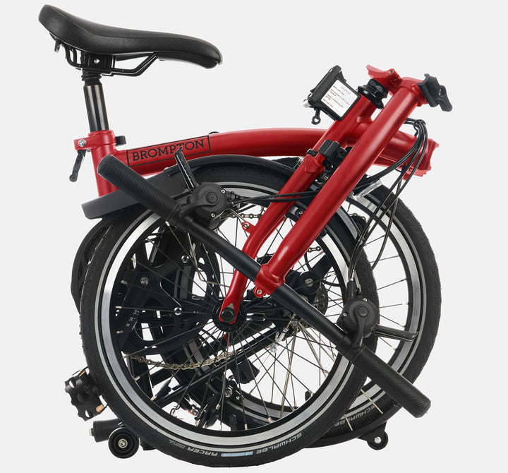 2023 Brompton C Line Explore Low Handlebar folding bike in House Red - folded