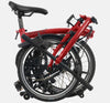 2023 Brompton C Line Explore Low Handlebar 6-speed folding bike in House Red - folded