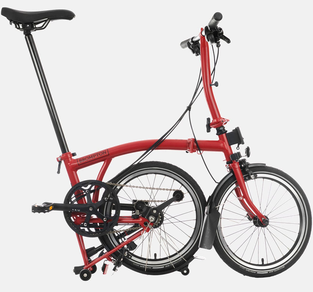2023 Brompton C Line Explore Low Handlebar folding bike in House Red - kickstand mode
