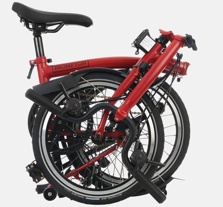 2023 Brompton C Line Explore Mid Handlebar 6 speed folding bike in House Red - folded