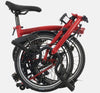 2023 Brompton C Line Urban Mid Handlebar 2-speed folding bike in House Red - folded