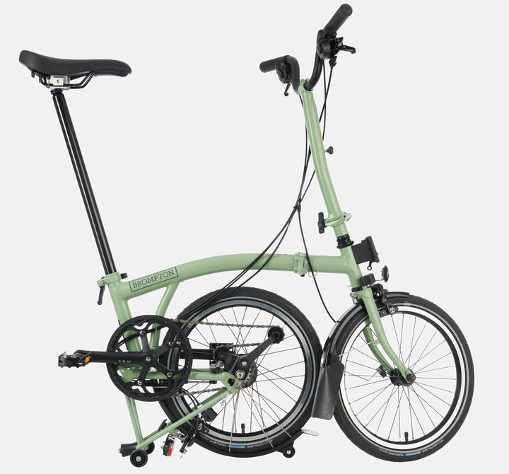 Brompton C Line Urban High Handlebar 2-speed folding bike in Matcha Green - kickstand mode