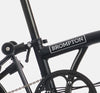 2023 Brompton C Line Explore Low Handlebar 6-speed folding bike in Matt Black - steel frame
