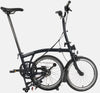 Brompton C Line Urban Mid Handlebar 2-speed folding bike in Matt Black - kickstand mode