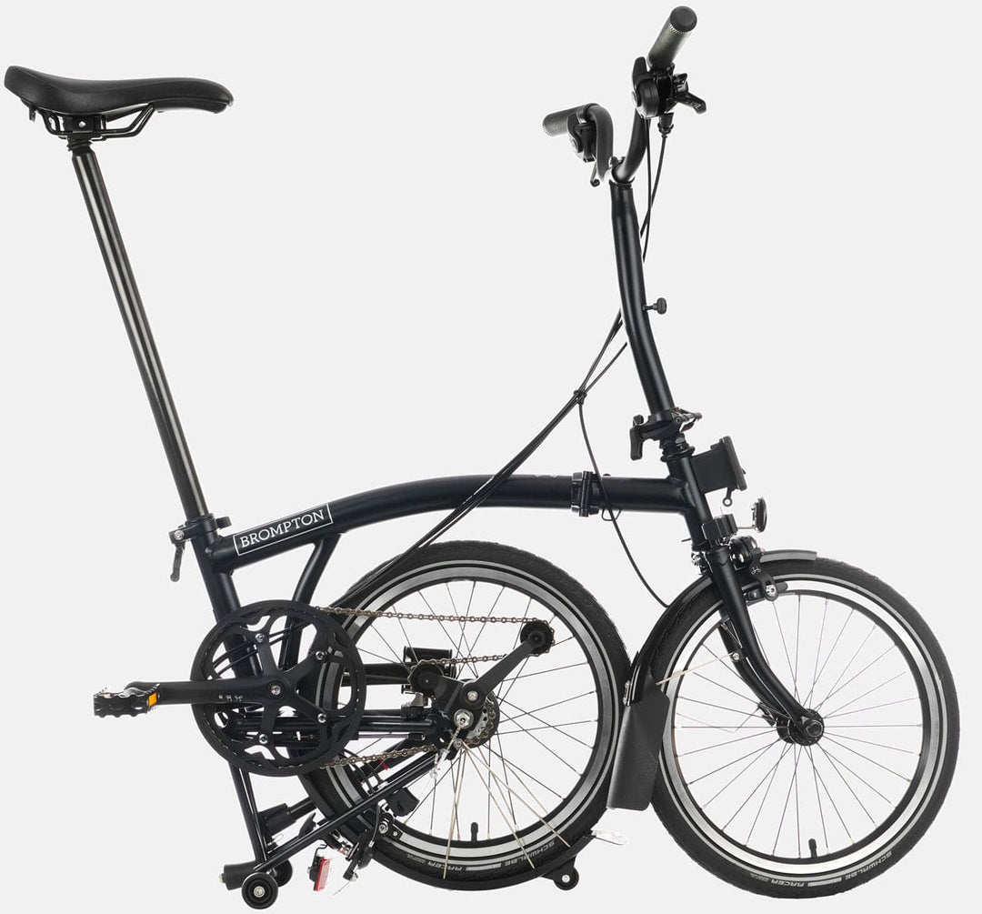 2023 Brompton C Line Explore Mid Handlebar 6-speed folding bike in Matt Black - kickstand mode