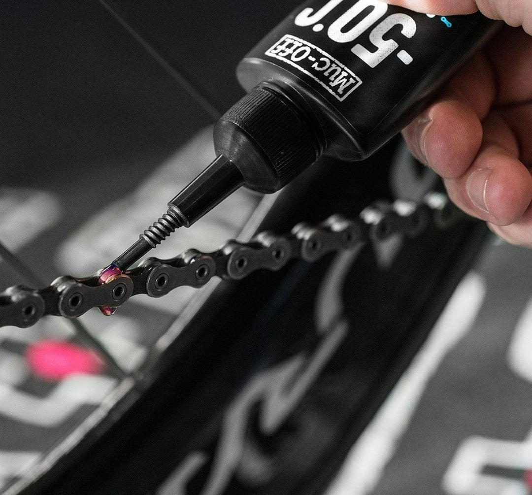 Muc-Off -50 Degree Winter Lubricant Being Applied to Bike Chain (4353626308659)