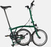 2023 Brompton C Line Urban High Handlebar 2-speed folding bike in Racing Green - kickstand mode