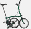 Brompton C Line Urban High Handlebar 2-speed folding bike in Racing Green - kickstand mode