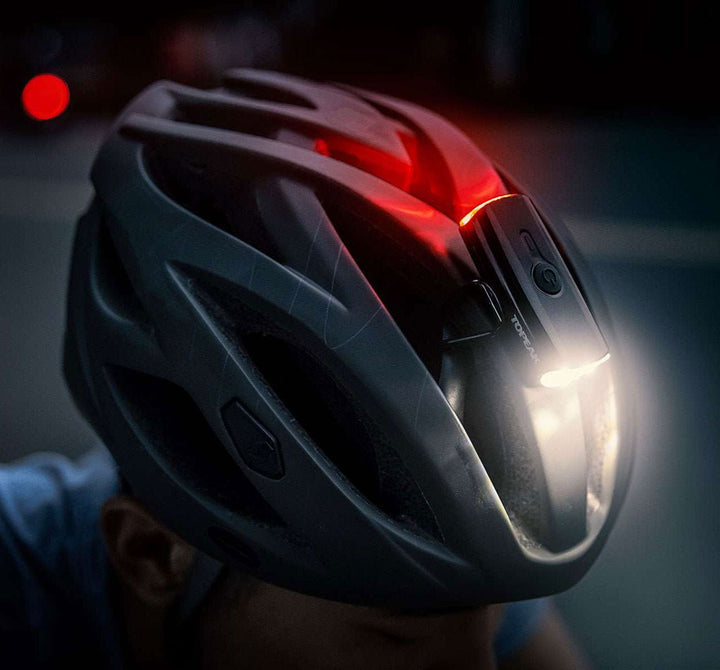 Topeak Headlux Dual USB Bicycle Light On Helmet Worn By Rider (1847594942515)